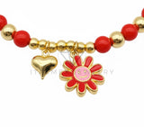 Pulsera de Lujo - 106851 - Pulsera Flor con Carita Feliz y Corazon con Bolitas Rojas - Oro Laminado 18K