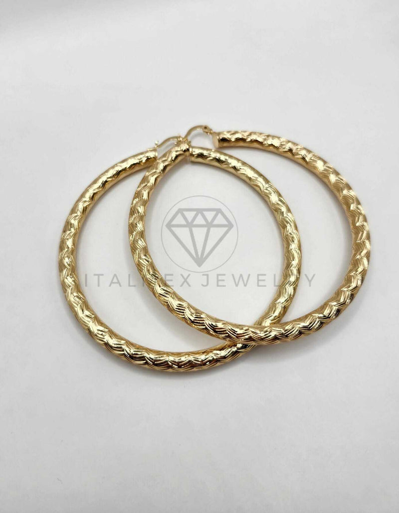 Arracada de Lujo - 106302 - Extra Grande. Arete Rayado Oro Laminado 18K