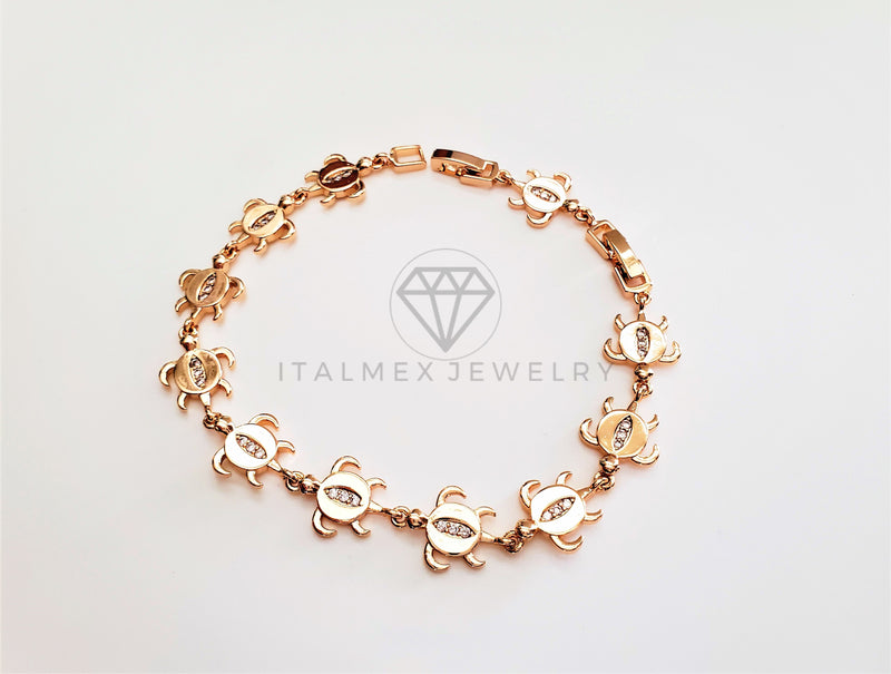 Pulsera Elegante - 103463 - Diseño de Tortugas con CZ Clara Oro Laminado 18K