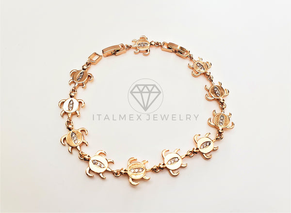Pulsera Elegante - 103463 - Diseño de Tortugas con CZ Clara Oro Laminado 18K