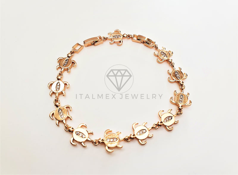 Pulsera Elegante - 103463 - Diseño de Tortugas con CZ Clara Oro Laminado 18K